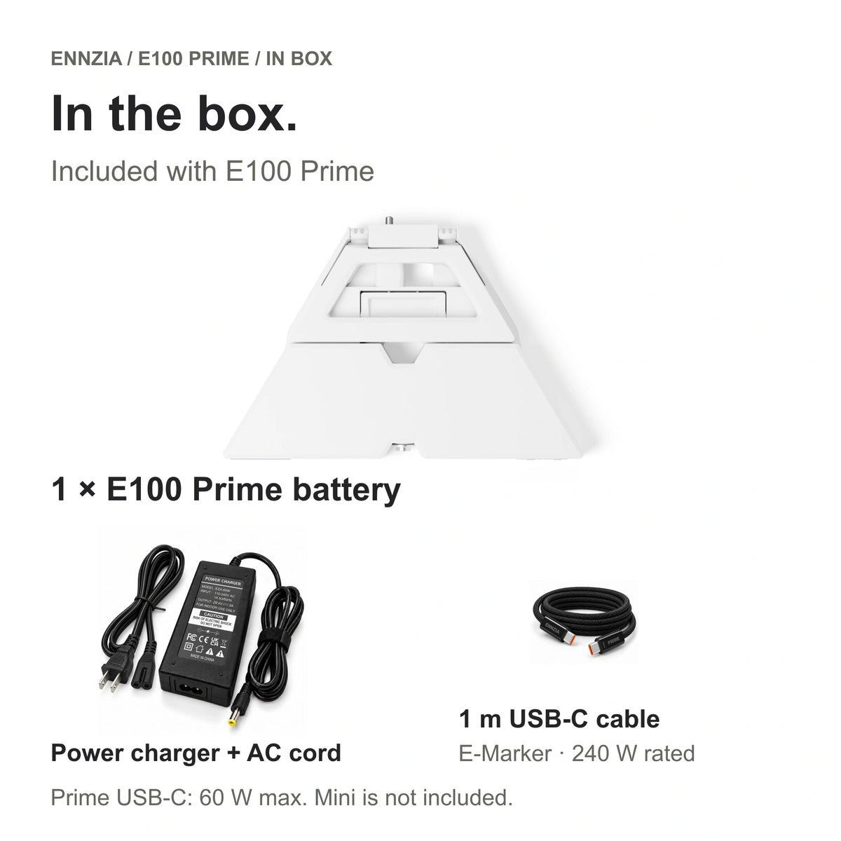 In the box — E100 Prime package hardware: battery, power charger and AC cord, plus the black ENNZIA PRIME USB-C cable